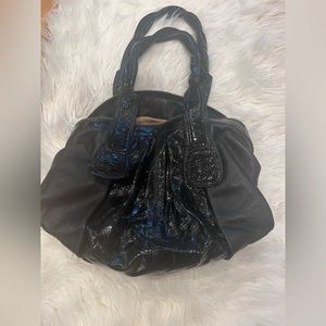 Gustto Black Leather Hobo Shoulder Purse With Gold Accents